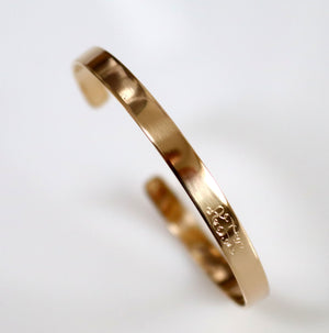 Narrow gold bangle with Vine 
 monogram initials