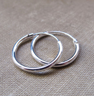 sterling silver Huggie Hoop Earrings by Nadin Art Design