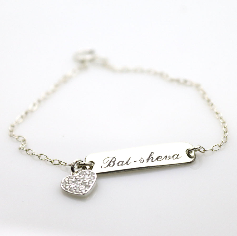 minimalist engraved name bracelet with diamond heart 