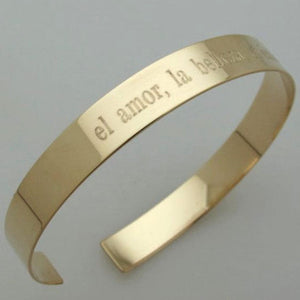 Gold engraved open bracelet