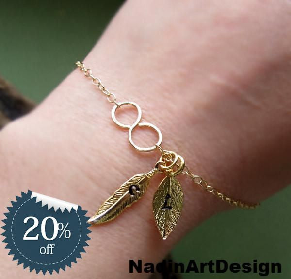 Infinity Bracelet with Personalized Leaf, Feather Charms